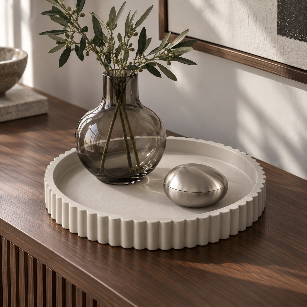 Gray tray styled with smoked glass and brushed nickel